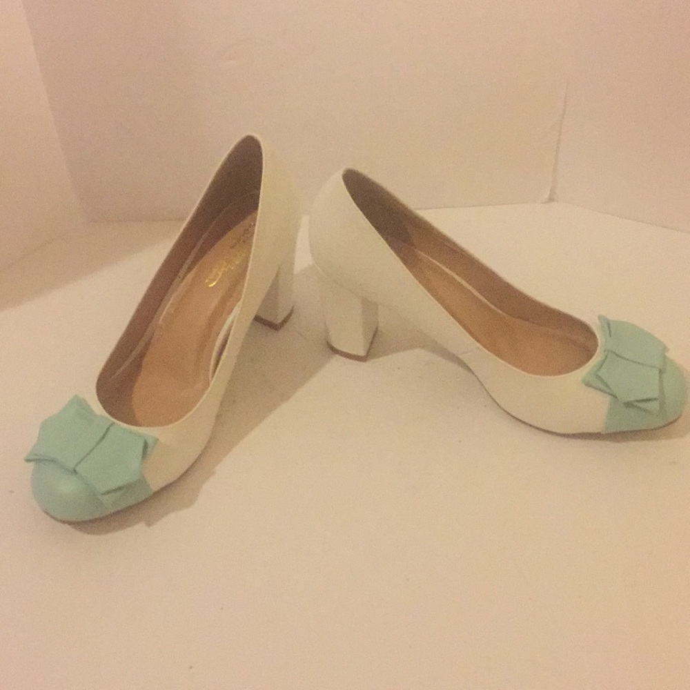Brand NEW heels with bow detail. Must have!